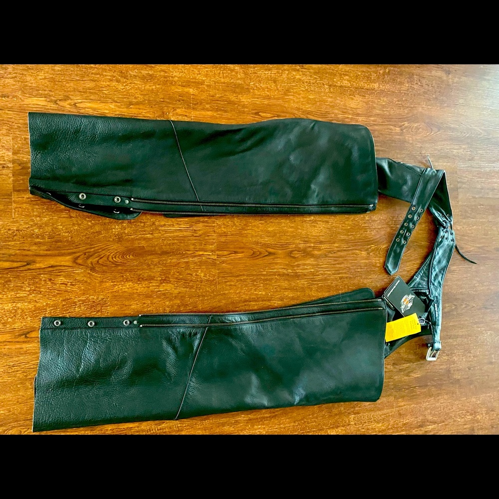 Women’s size small Harley-Davidson Black leather chaps.  Brand new
